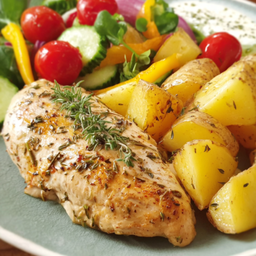 Kräuterhähnchen mit buntem Salat